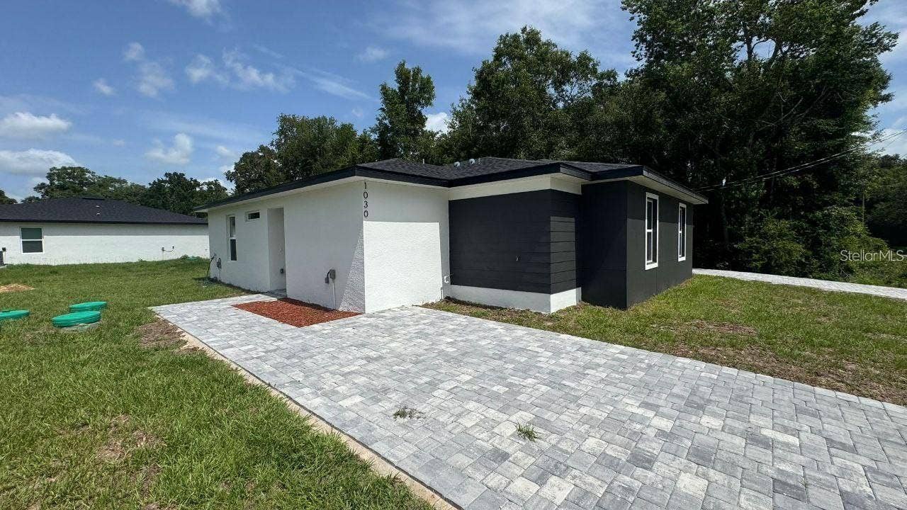 1030 NW 57TH COURT, Ocala, FL 34482 Prior listing photo; may depict a builder model. Verify current property condition.