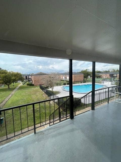 5325 CURRY FORD ROAD, #B205, Orlando, FL 32812 Balcony with pool and common space view