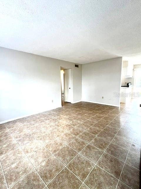 5325 CURRY FORD ROAD, #B205, Orlando, FL 32812 Living Room view from front door