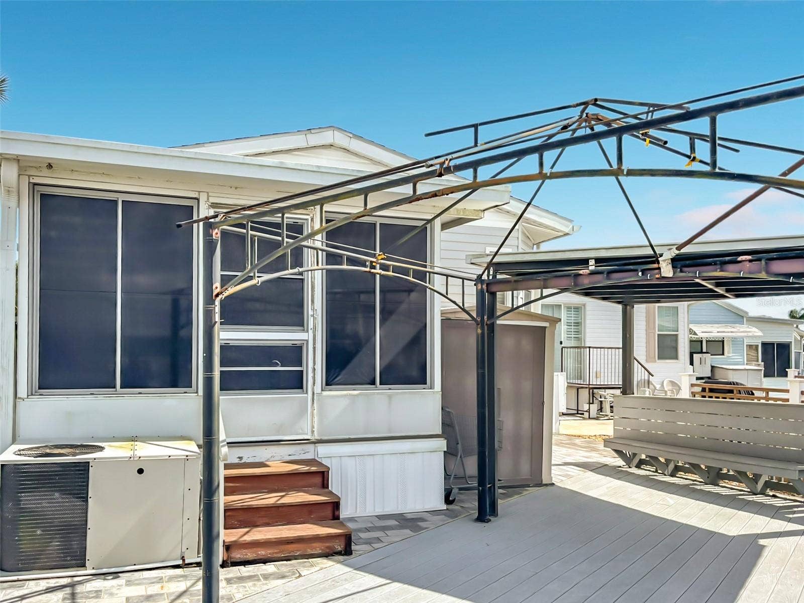 9000 US HIGHWAY 192, #181, Clermont, FL 34714 Expansive trex deck overlooks the canal to the rear of thr property