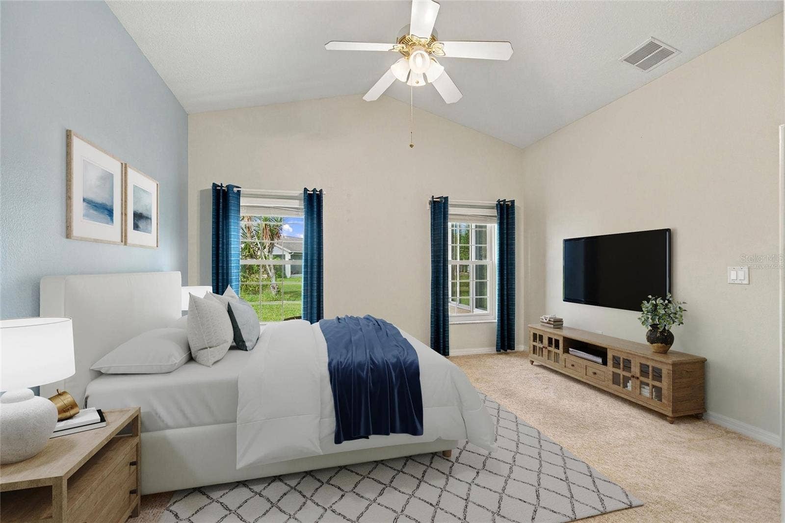 Virtually staged primary en suite bedroom in back of house