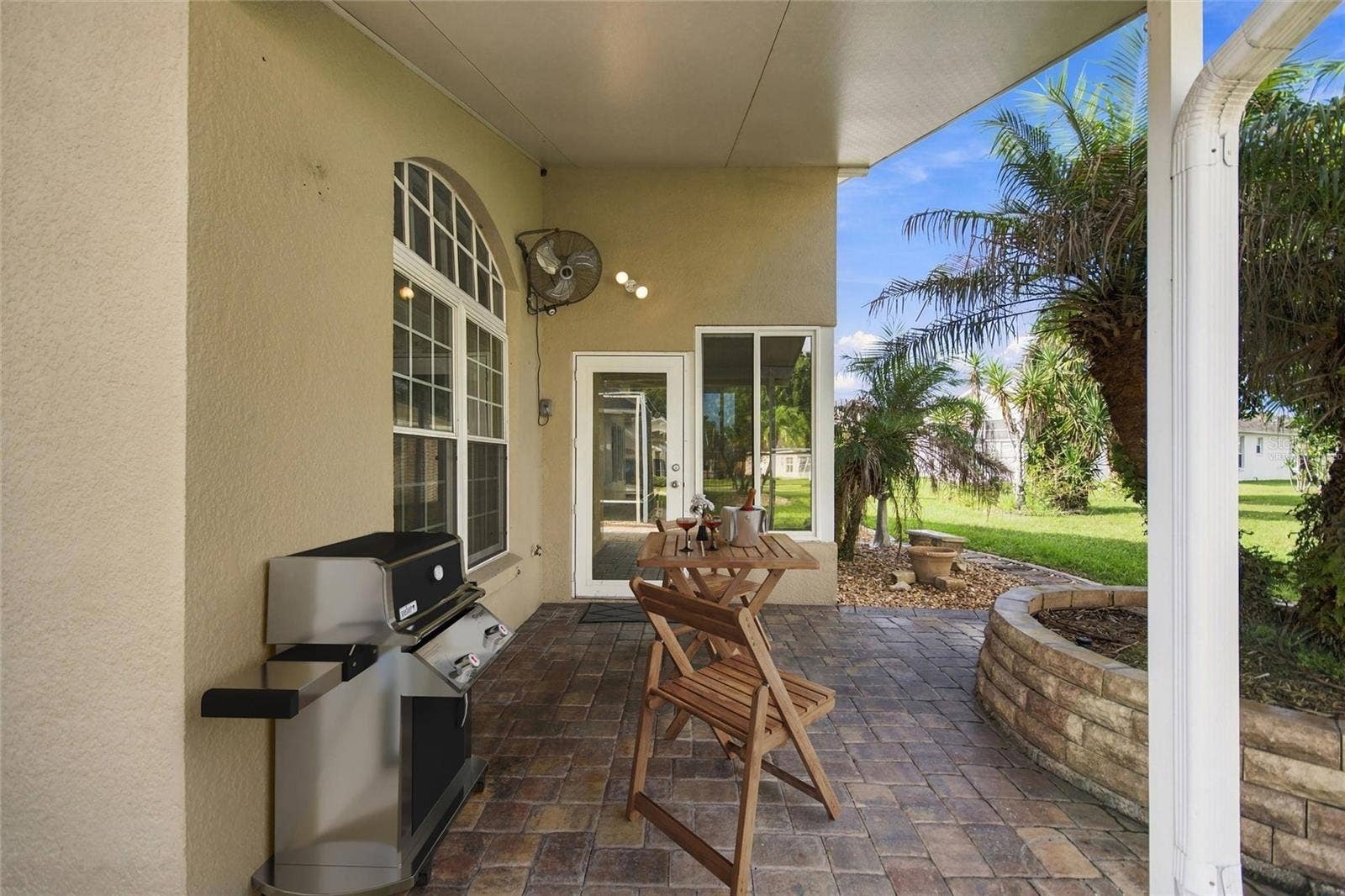 Virtually staged under-roof Patio