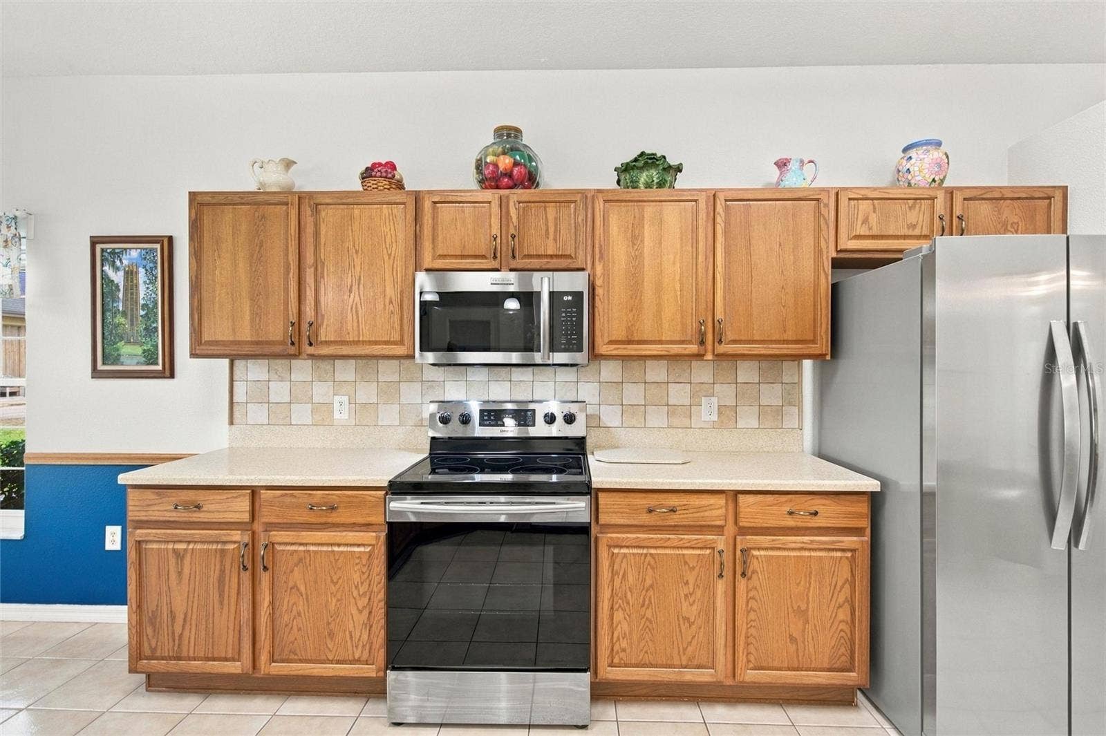 Stainless steel range, microwave and refrigerator