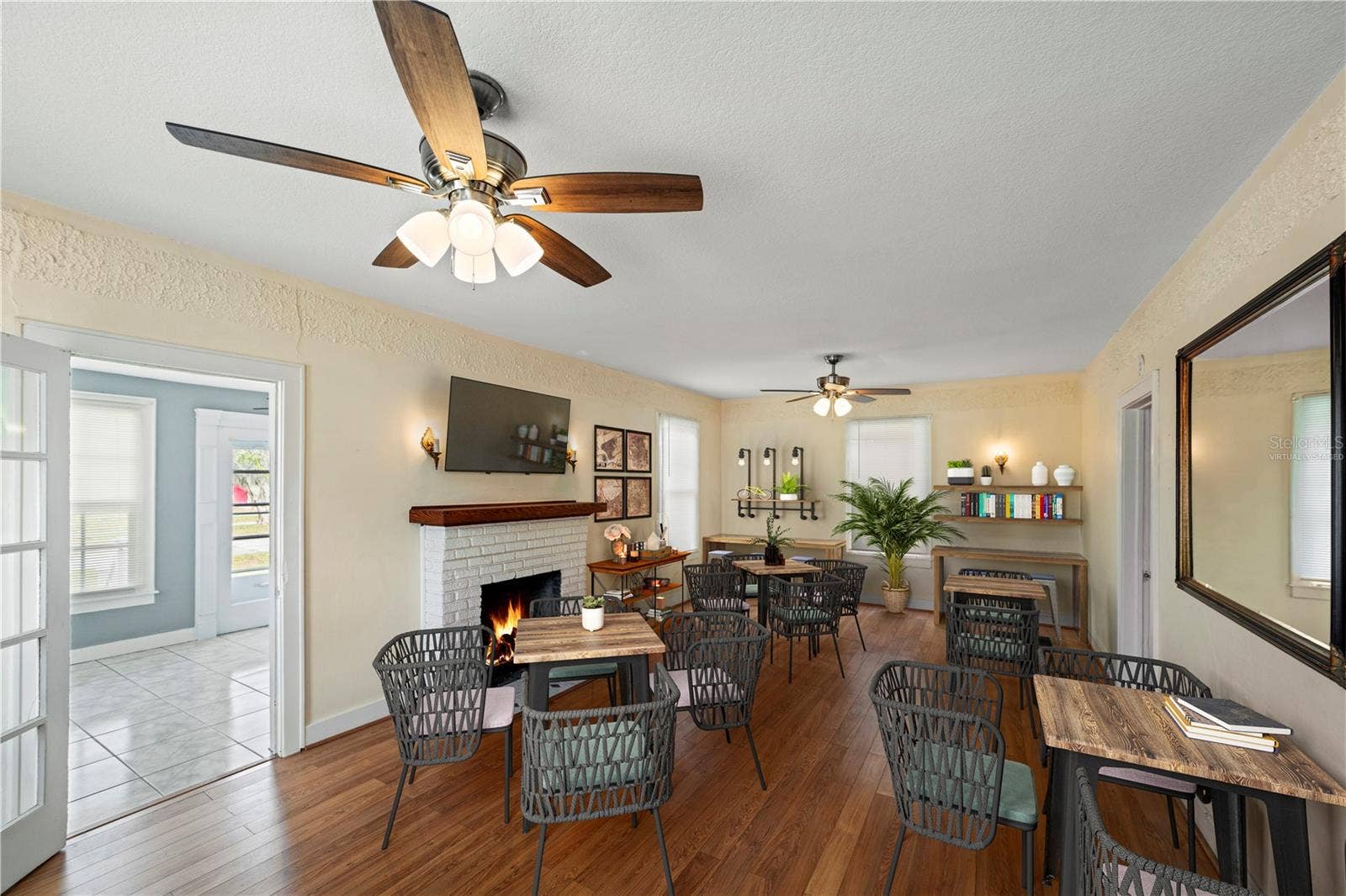 Living room (virtually staged as a cafe)
