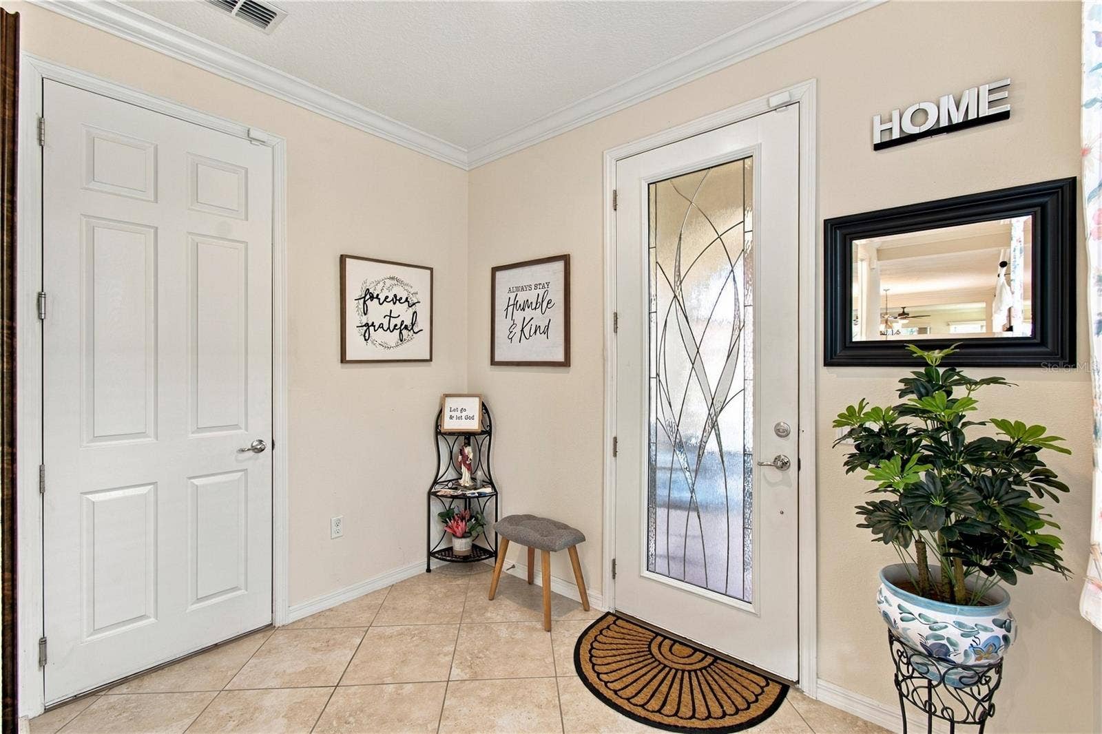 814 SHADY CANYON WAY, Poinciana, FL 34759 LEADED GLASS DOOR AT FRONT ENTRY