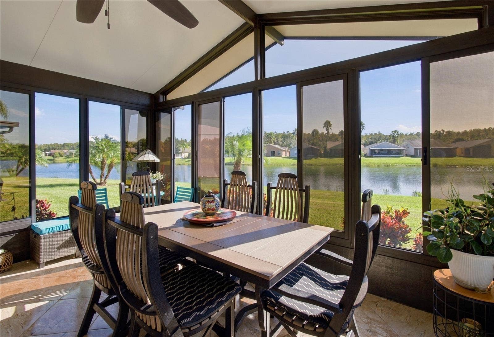 137 RIALTO RD, Poinciana, FL 34759 ENJOY SUNRISE VIEWS FROM ENCLOSED TILED SUNROOM