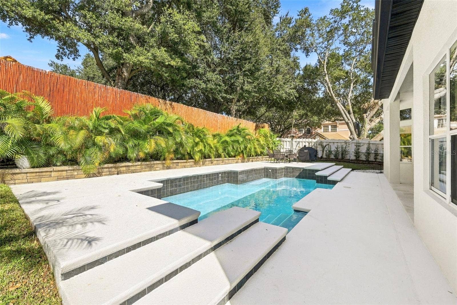 7002 PHILLIPS COVE COURT, Orlando, FL 32819 Heated Pool