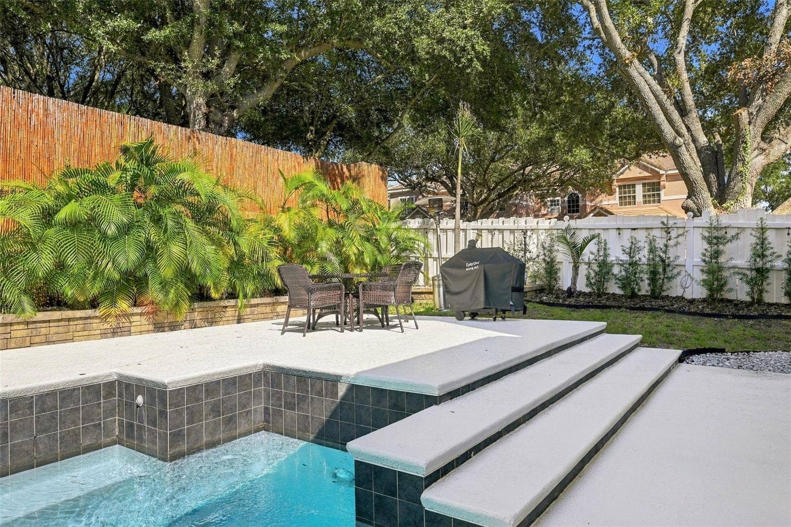 7002 PHILLIPS COVE COURT, Orlando, FL 32819 Heated Pool