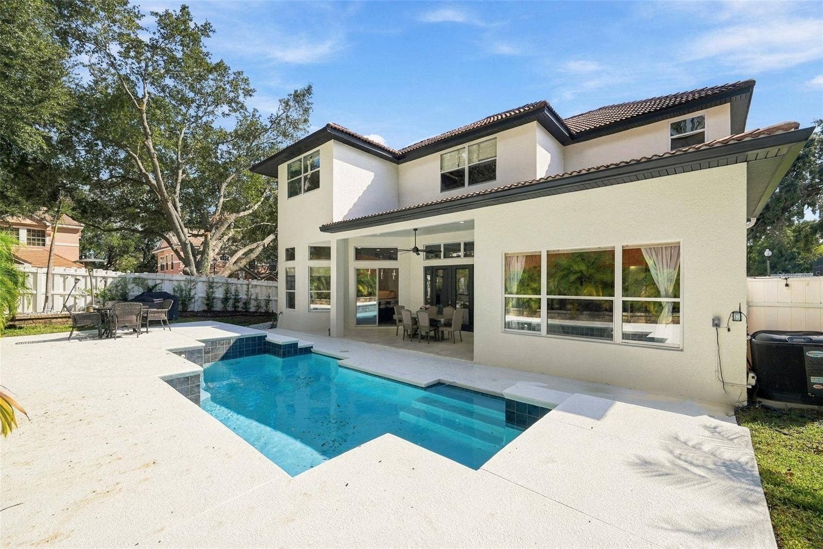 7002 PHILLIPS COVE COURT, Orlando, FL 32819 Heated Pool