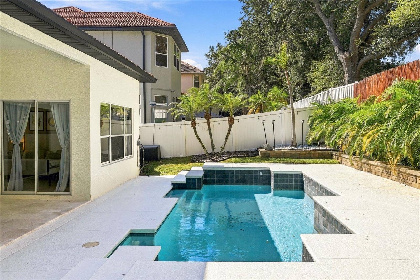 7002 PHILLIPS COVE COURT, Orlando, FL 32819 Heated Pool