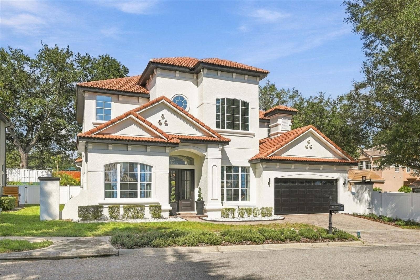 7002 PHILLIPS COVE COURT, Orlando, FL 32819 7002 PHILLIPS COVE COURT, Orlando, FL 32819