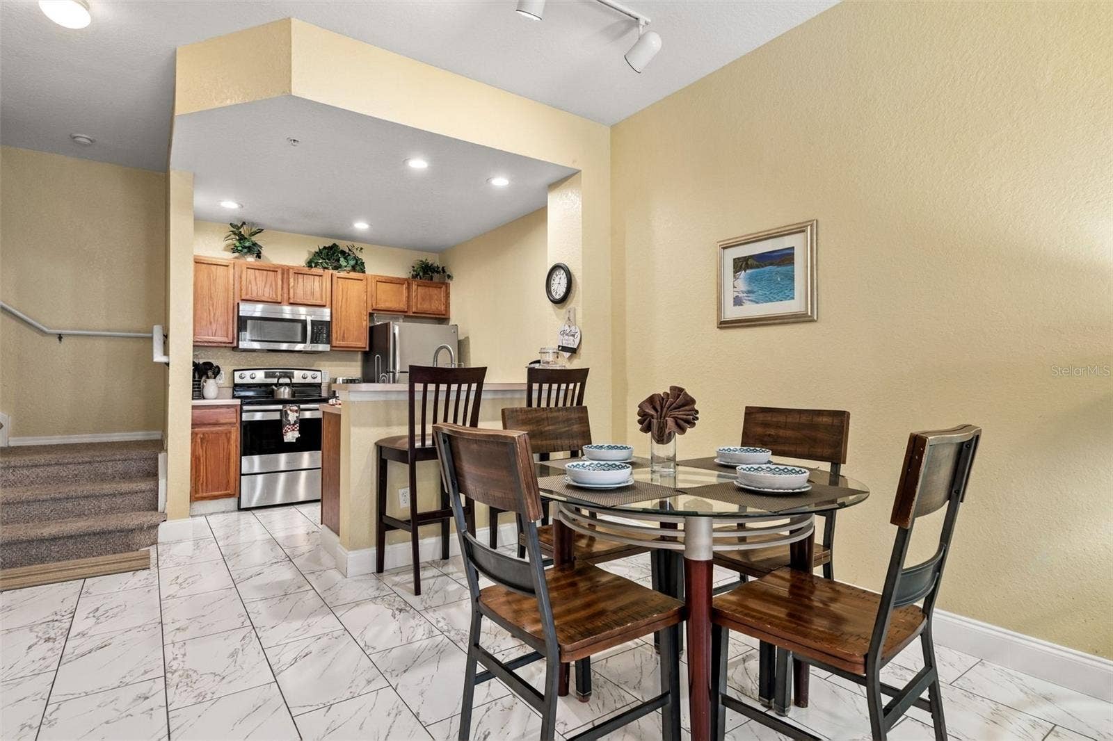 4600 YELLOWGOLD ROAD W, #105, Kissimmee, FL 34746 Dinning Area / Kitchen with high-top seating.