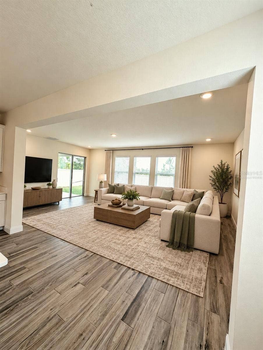 952 VINEYARD RIDGE ROAD, Minneola, FL 34715 Family Room Virtually Staged