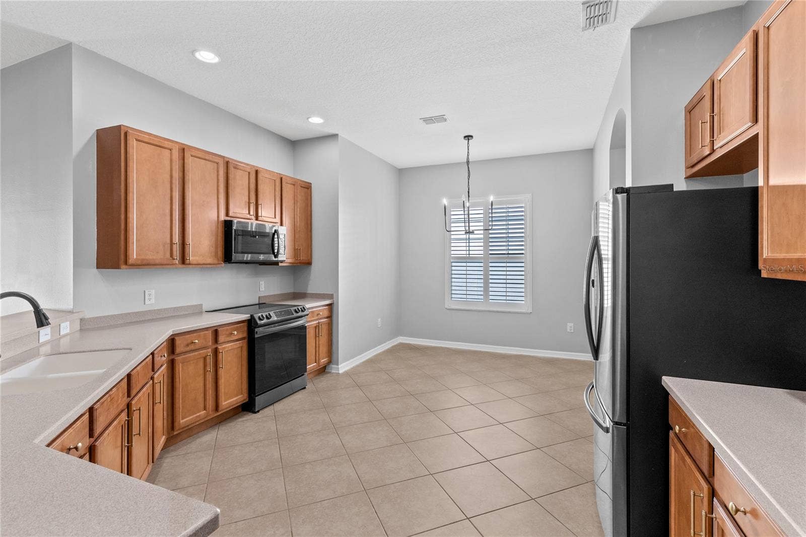 3214 BAYFLOWER AVE, Harmony, FL 34773 Kitchen with dinette
