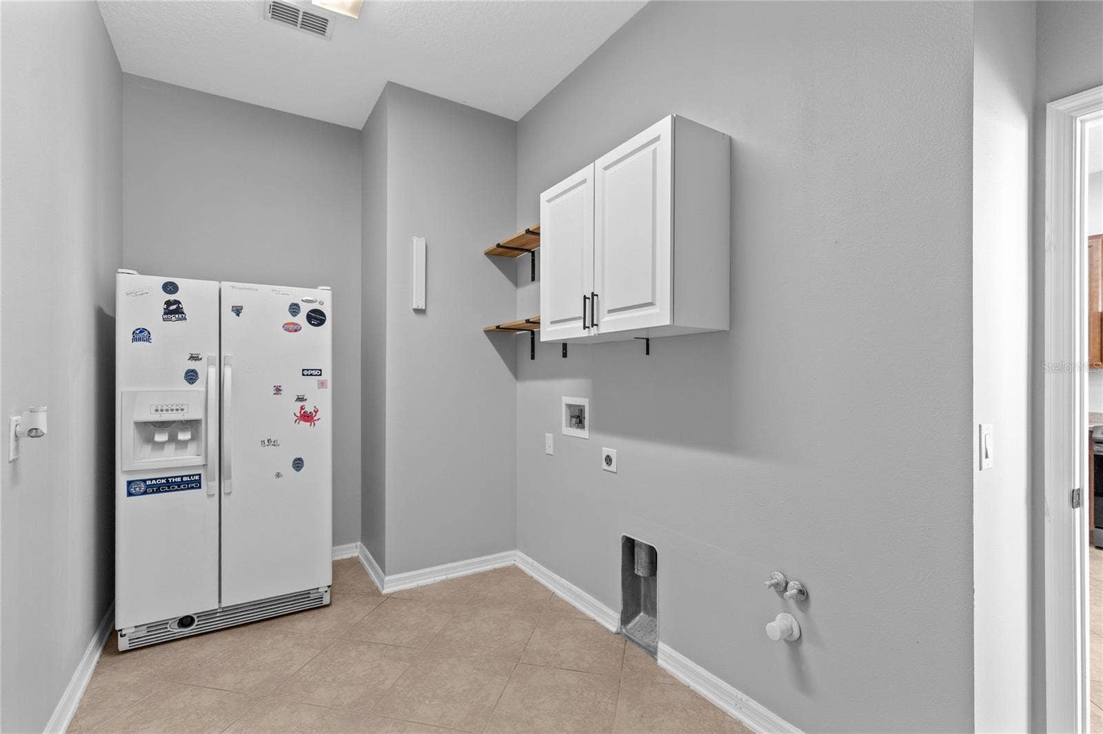 3214 BAYFLOWER AVE, Harmony, FL 34773 Laundry room