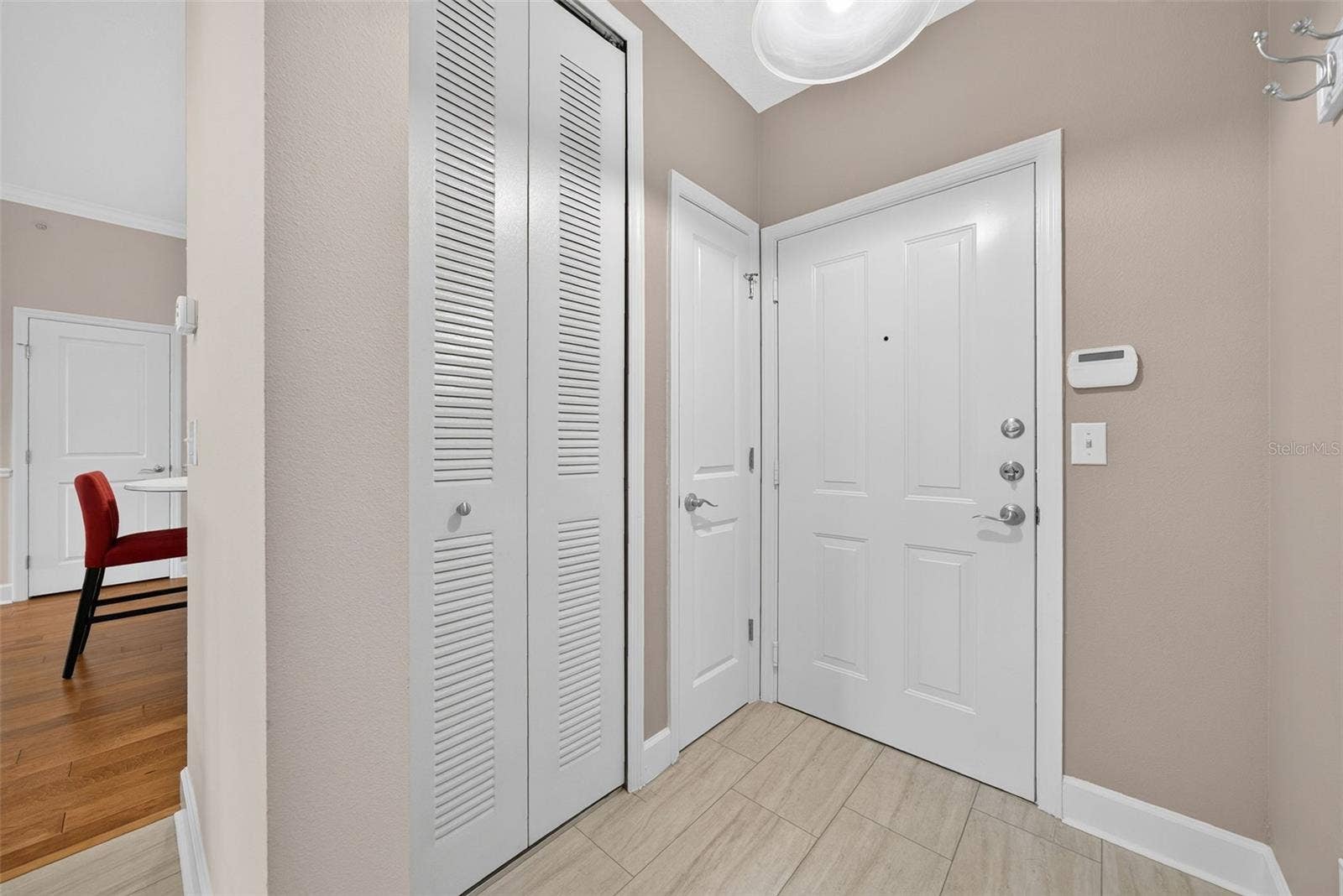 1231 WRIGHT CIRCLE, #108, Celebration, FL 34747 Door to Attached Garage