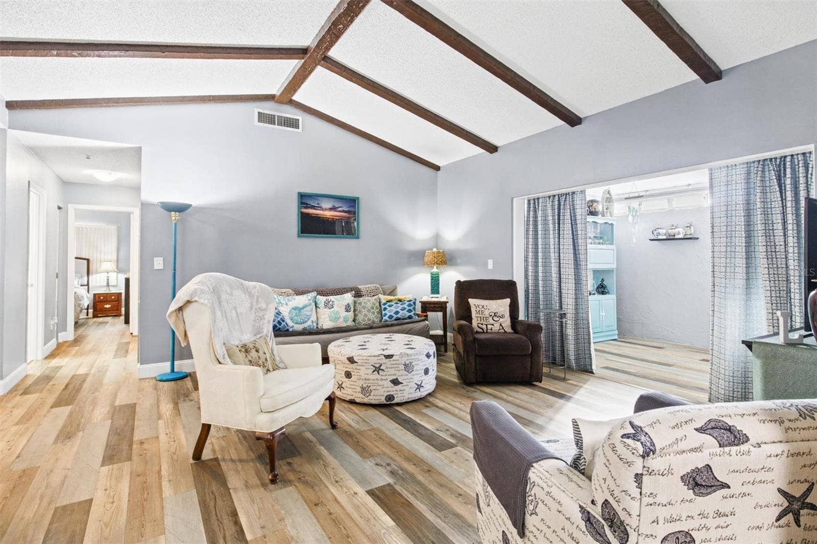 273 MARIPOSA STREET, Winter Haven, FL 33884 Living Room - Vaulted Ceilings with Wood Beams