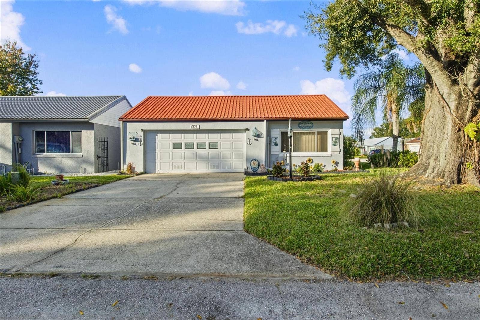 273 MARIPOSA STREET, Winter Haven, FL 33884 Front Exterior - Corner Lot Location