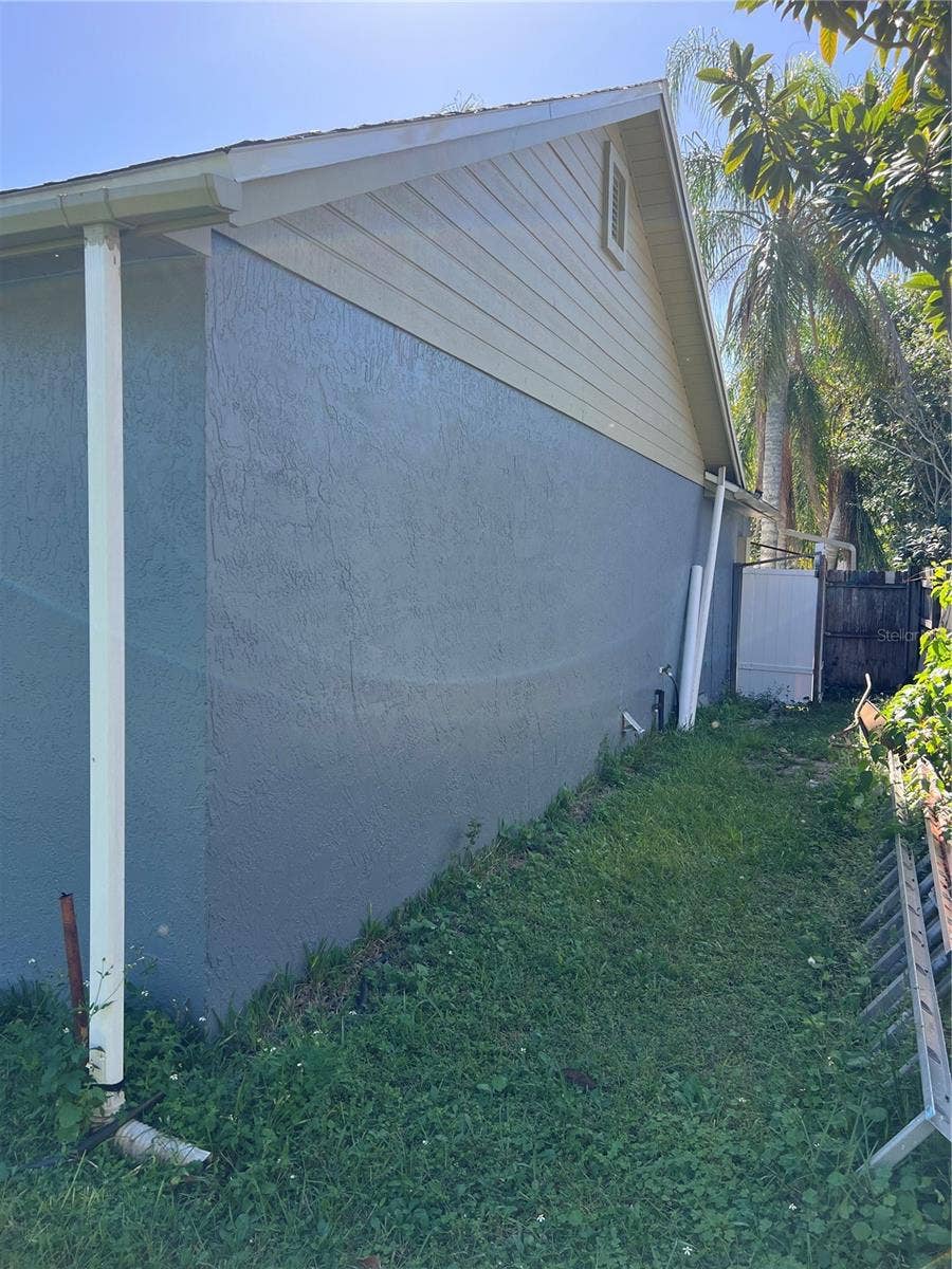 1557 WYMAN CIRCLE, Kissimmee, FL 34744 Right side Exterior