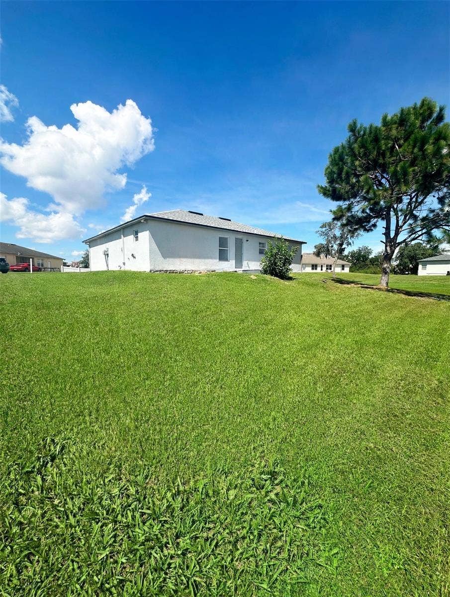 1921 DRUM DRIVE, Poinciana, FL 34759