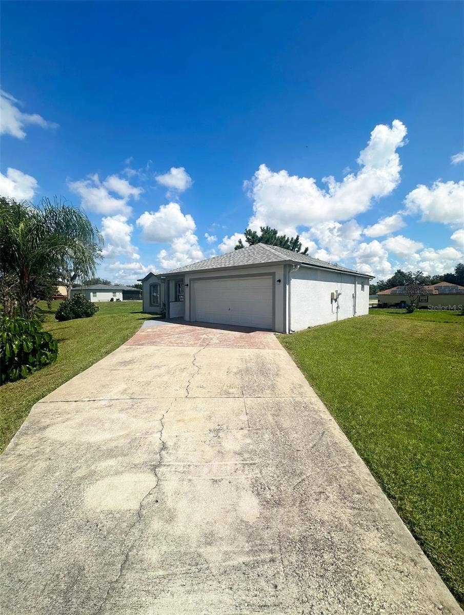 1921 DRUM DRIVE, Poinciana, FL 34759