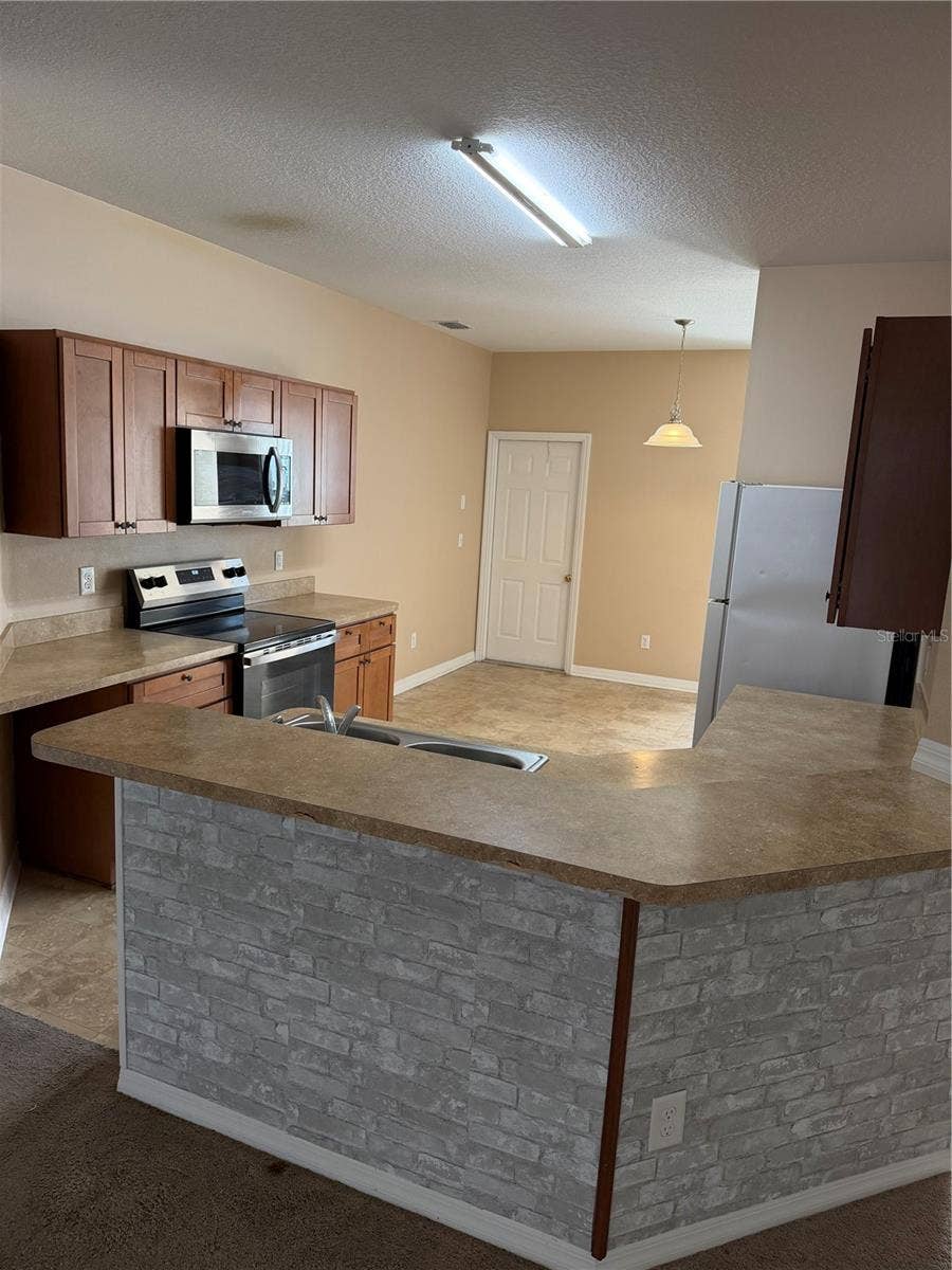1211 KNOLLWOOD DRIVE, Davenport, FL 33837