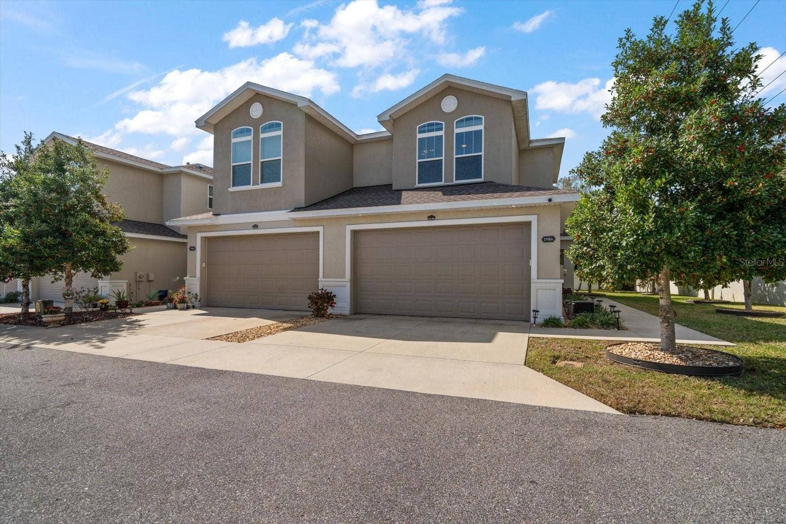 1986 LAKE RIDGE BOULEVARD, Clearwater, FL 33763 Front Exterior - 2 Car Garage