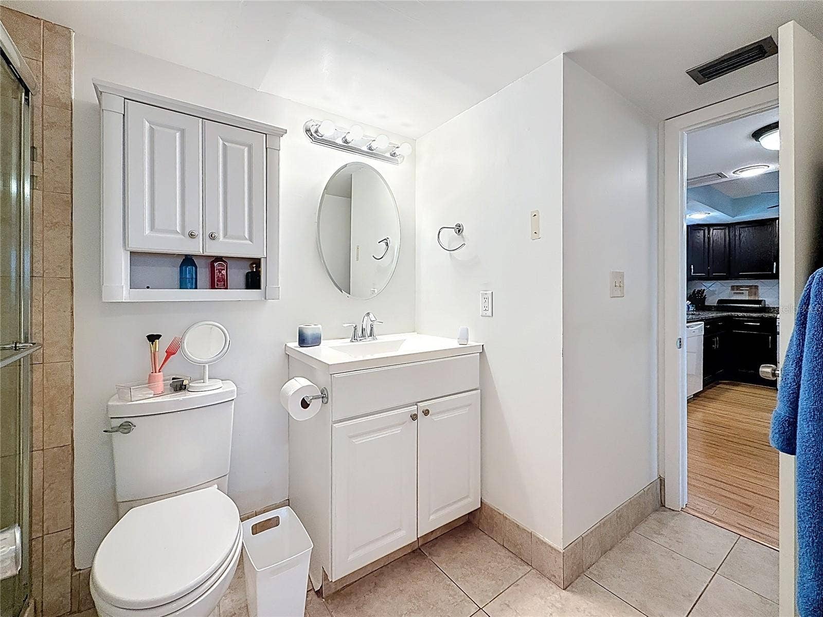 4725 COVE CIRCLE, #908, St Petersburg, FL 33708 This shows the other entrance off the kitchen into this nicely updated bathroom