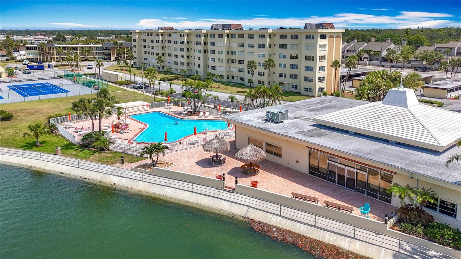 4725 COVE CIRCLE, #908, St Petersburg, FL 33708 This aerial shows the pool by the clubhouse and the back of the clubhouse