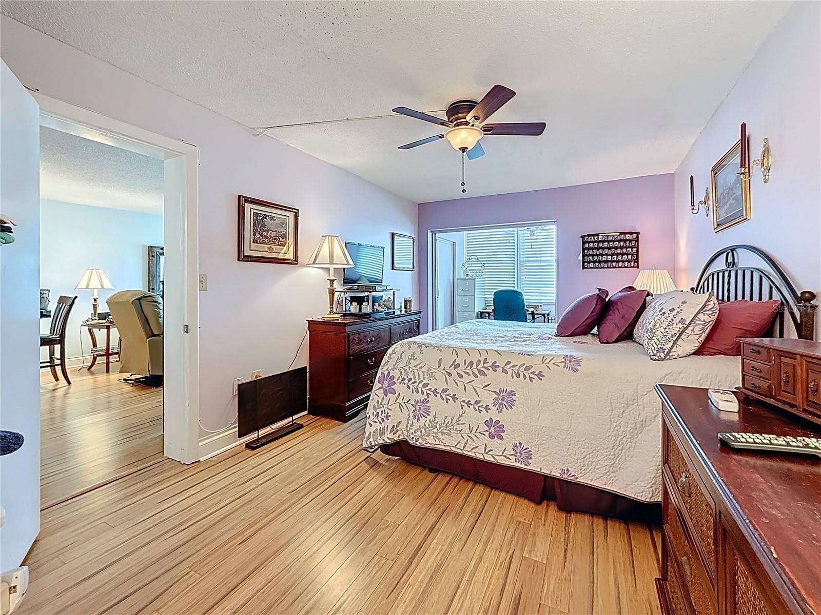 4725 COVE CIRCLE, #908, St Petersburg, FL 33708 This is the spacious bedroom with bamboo flooring.