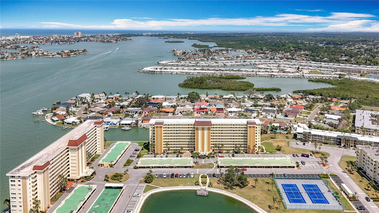 4725 COVE CIRCLE, #908, St Petersburg, FL 33708 Aerial view of the front of the Columbia building showing how nicely situated this building is to all of the activities that Sea Towers offers.
