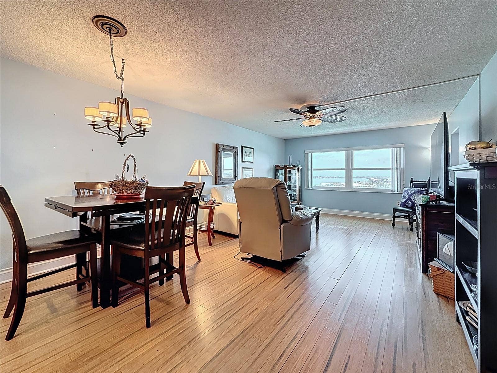 4725 COVE CIRCLE, #908, St Petersburg, FL 33708 Take a look at how spacious the dining and living area is with beautiful views of the water.