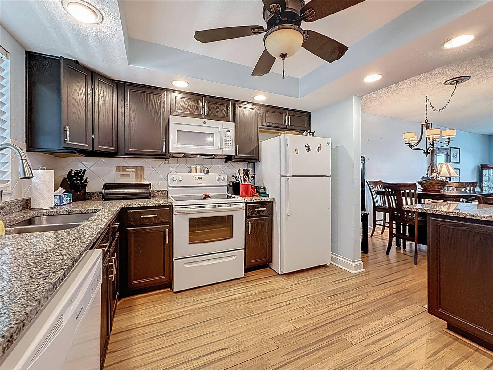 4725 COVE CIRCLE, #908, St Petersburg, FL 33708 How nice is this - updated kitchen for everyone that loves to cook - great for entertaining with lots of space.