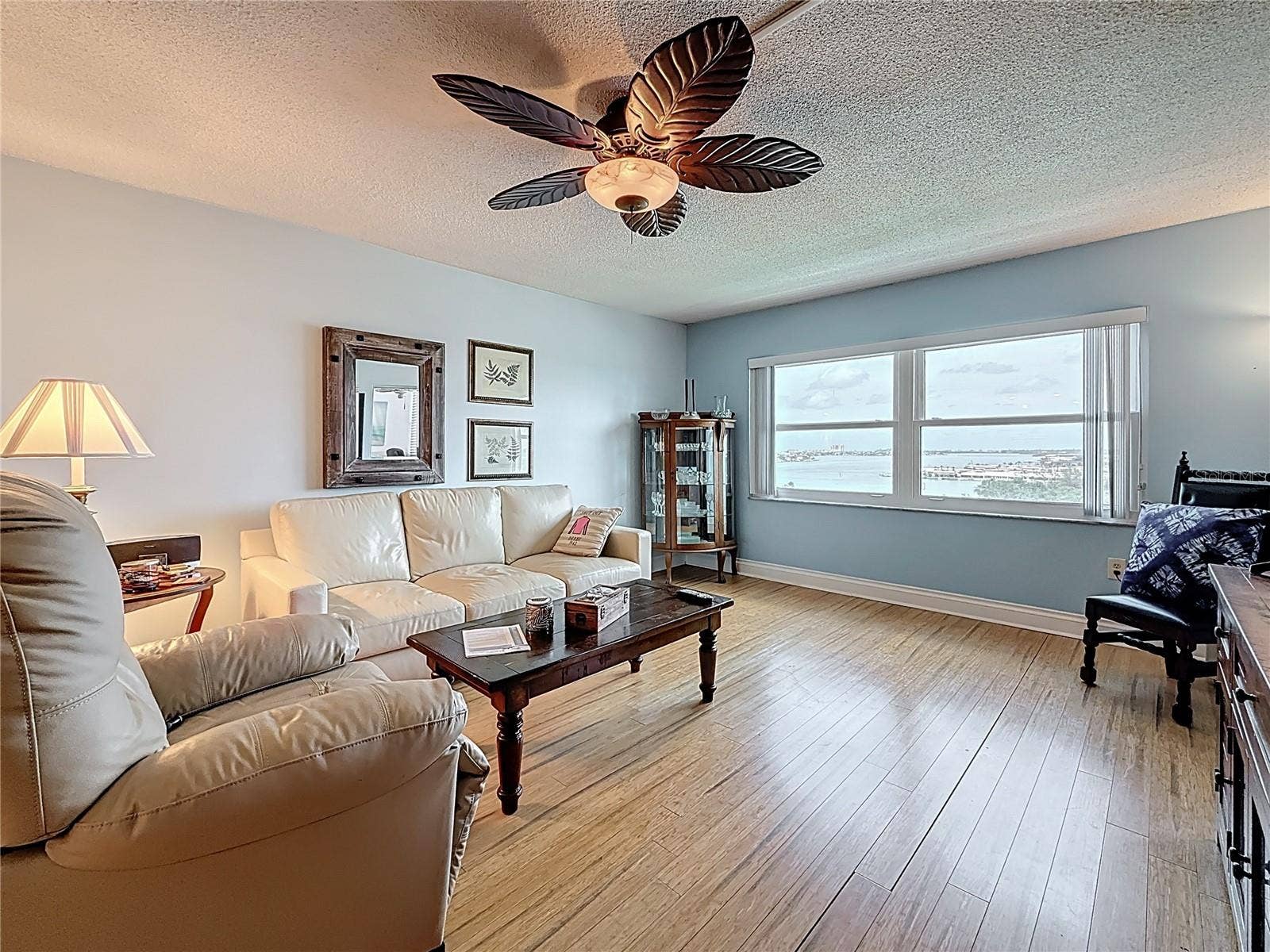 4725 COVE CIRCLE, #908, St Petersburg, FL 33708 This is a closer look at how nice the water views are from the living room. Keep in mind all the windows in this unit are impact hurricane windows.