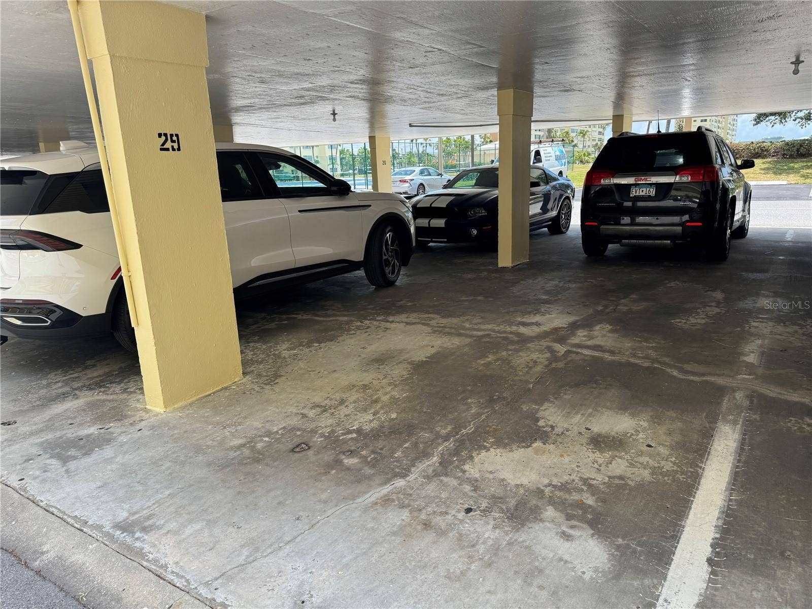 4725 COVE CIRCLE, #908, St Petersburg, FL 33708 Covered parking space that conveys with this unit and is located right in front of the building