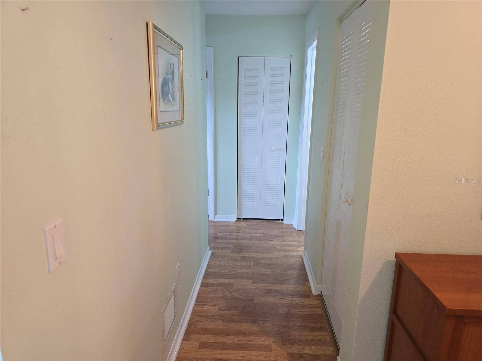 HALLWAY TO THE BEDROOMS.