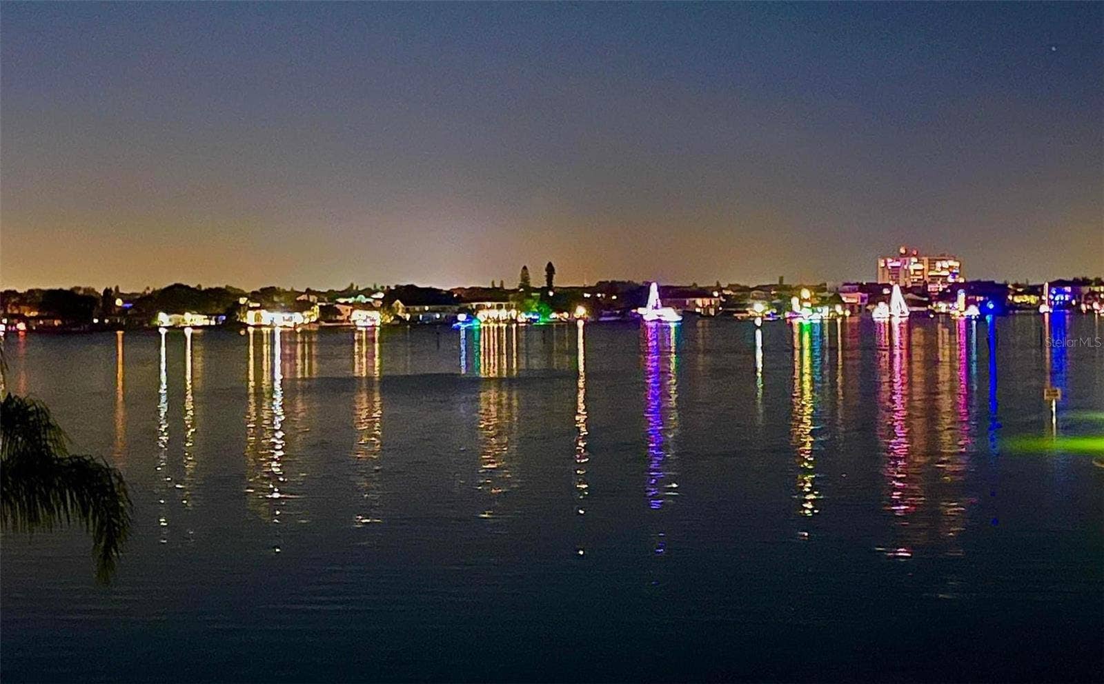 1893 SHORE DRIVE S, #209, South Pasadena, FL 33707 Holiday boat parade from the Florida room.