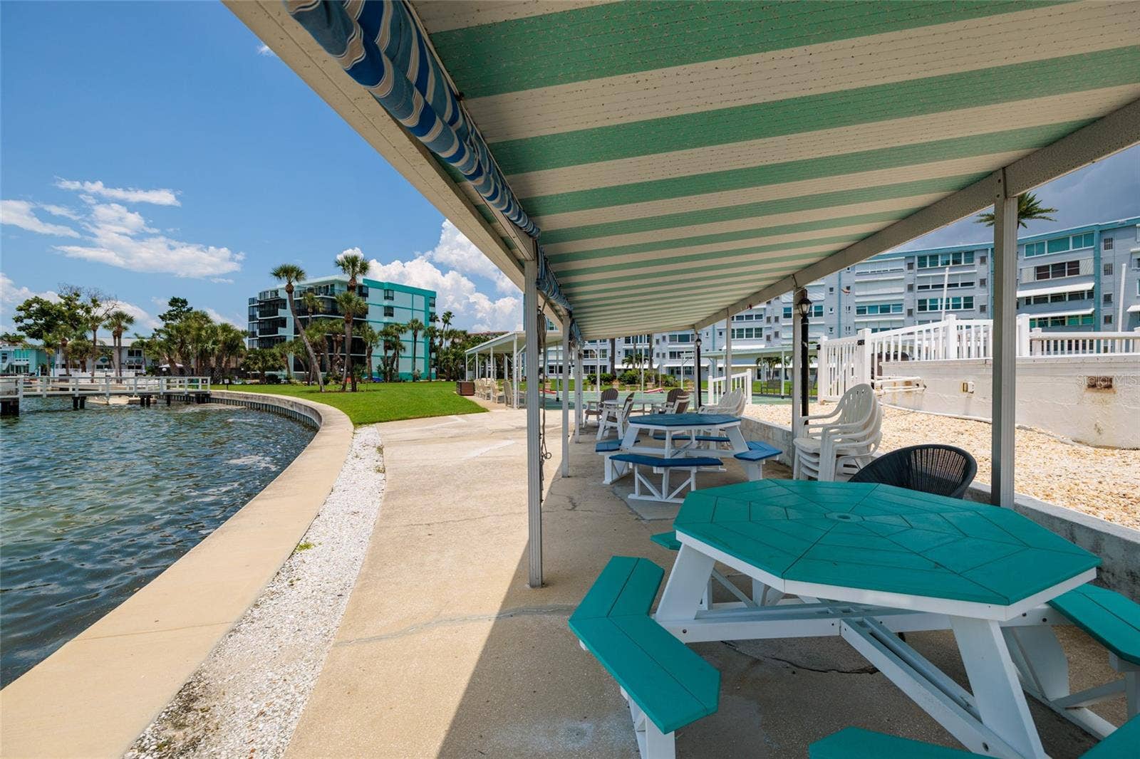 1893 SHORE DRIVE S, #209, South Pasadena, FL 33707 Community waterfront picnic area at the clubhouse. Outside bathrooms at the clubhouse.