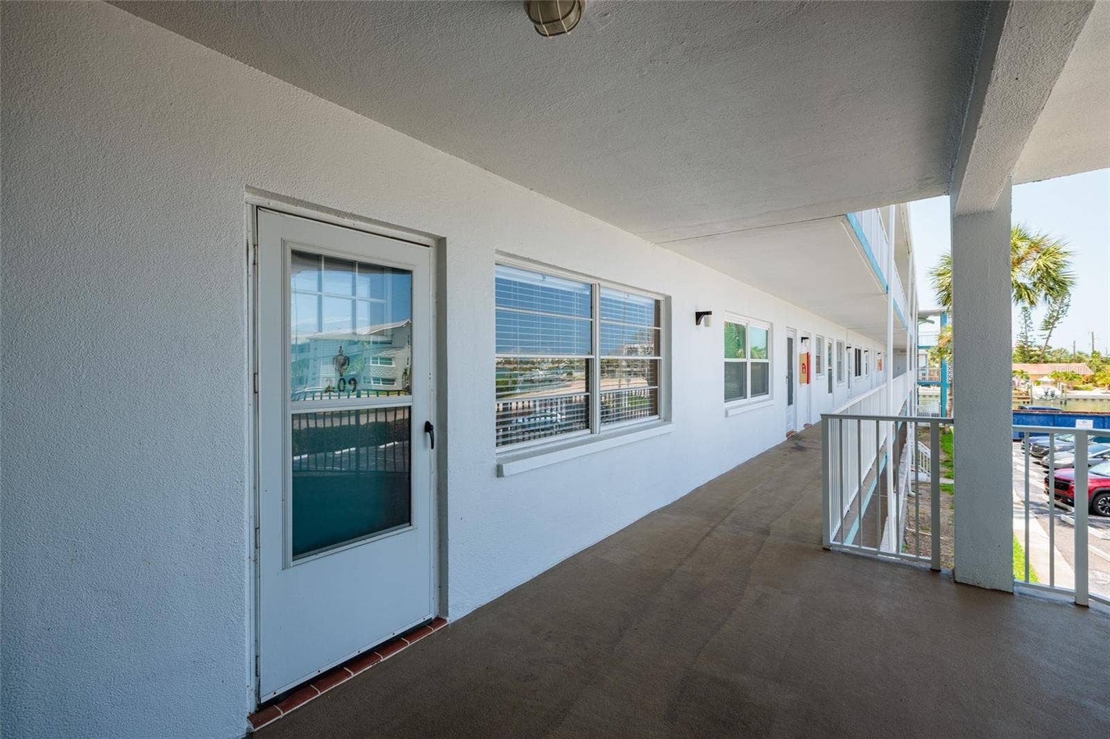 1893 SHORE DRIVE S, #209, South Pasadena, FL 33707 Unit 209 on 2nd floor w/Screened storm door. Laundry room on this floor too (they're on every floor).