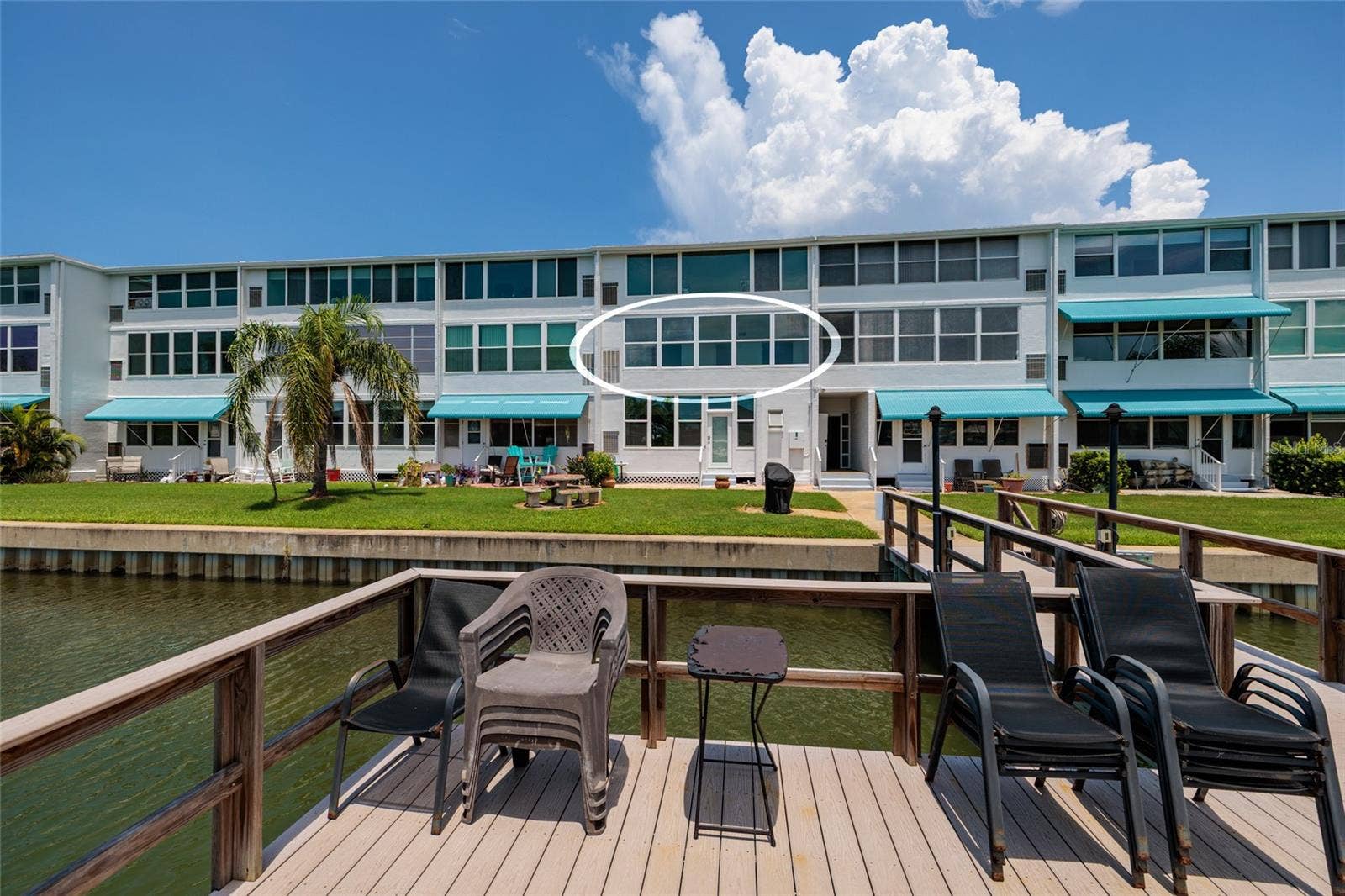 1893 SHORE DRIVE S, #209, South Pasadena, FL 33707 #209 is a short distance to the dock & grilling area.