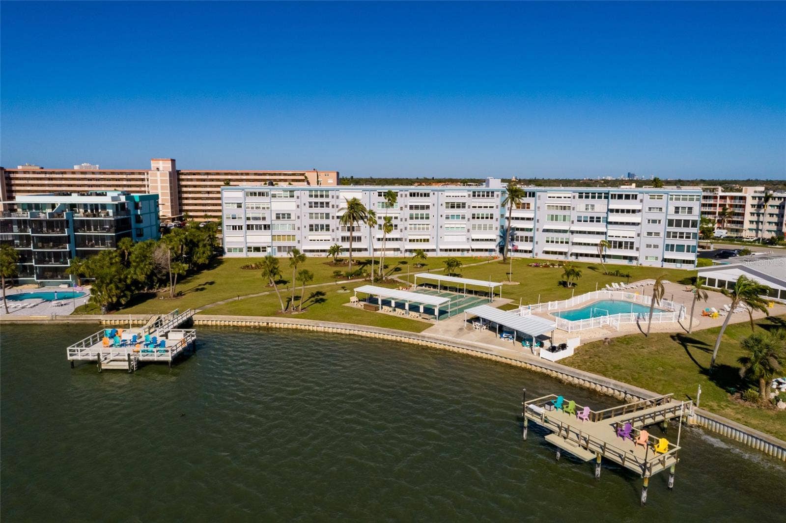 1893 SHORE DRIVE S, #209, South Pasadena, FL 33707 Shore community pool/clubhouse, waterfront grilling area & shuffleboard courts.