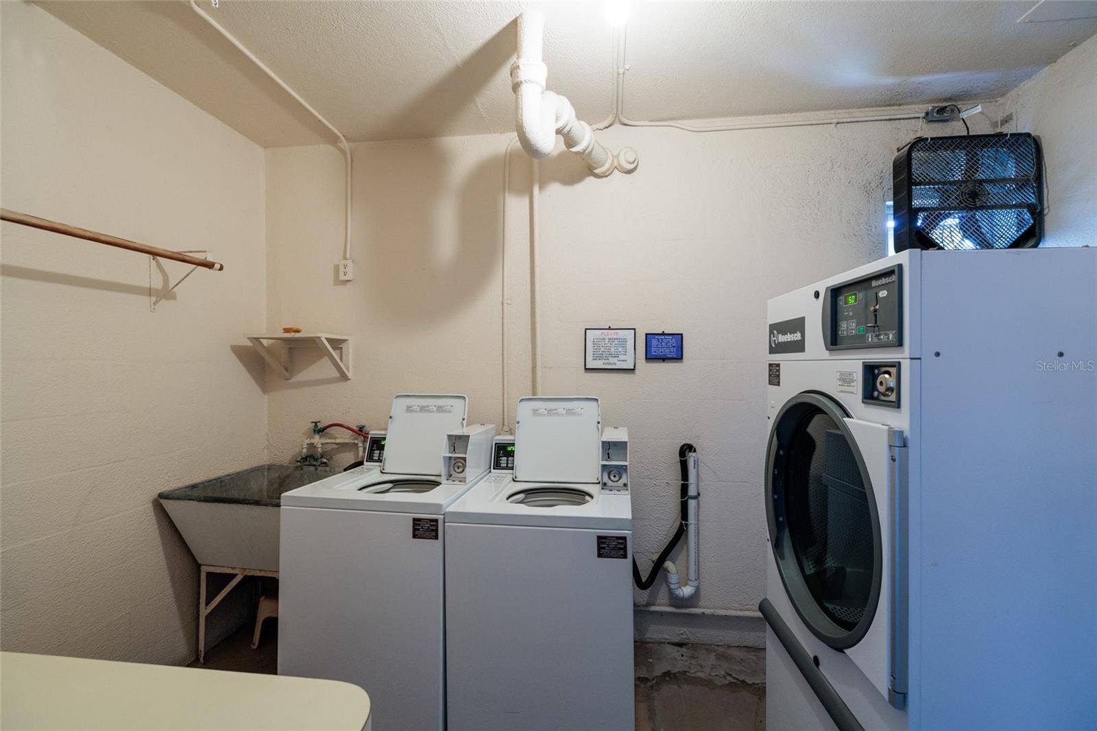 1893 SHORE DRIVE S, #209, South Pasadena, FL 33707 Each floor has a Laundry room by the elevator. Outside shared storage room is next door.
