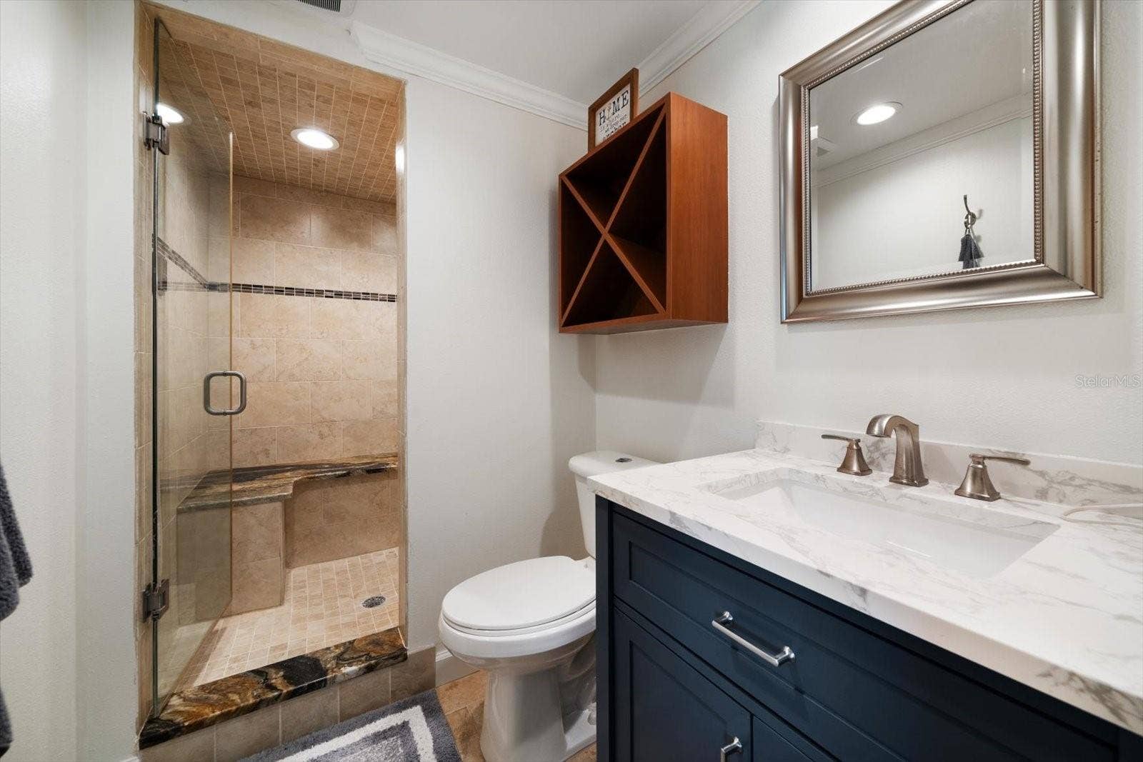 119 MARINA DEL REY COURT, Clearwater Beach, FL 33767 This private bonus area offers access to the ground level terrace.