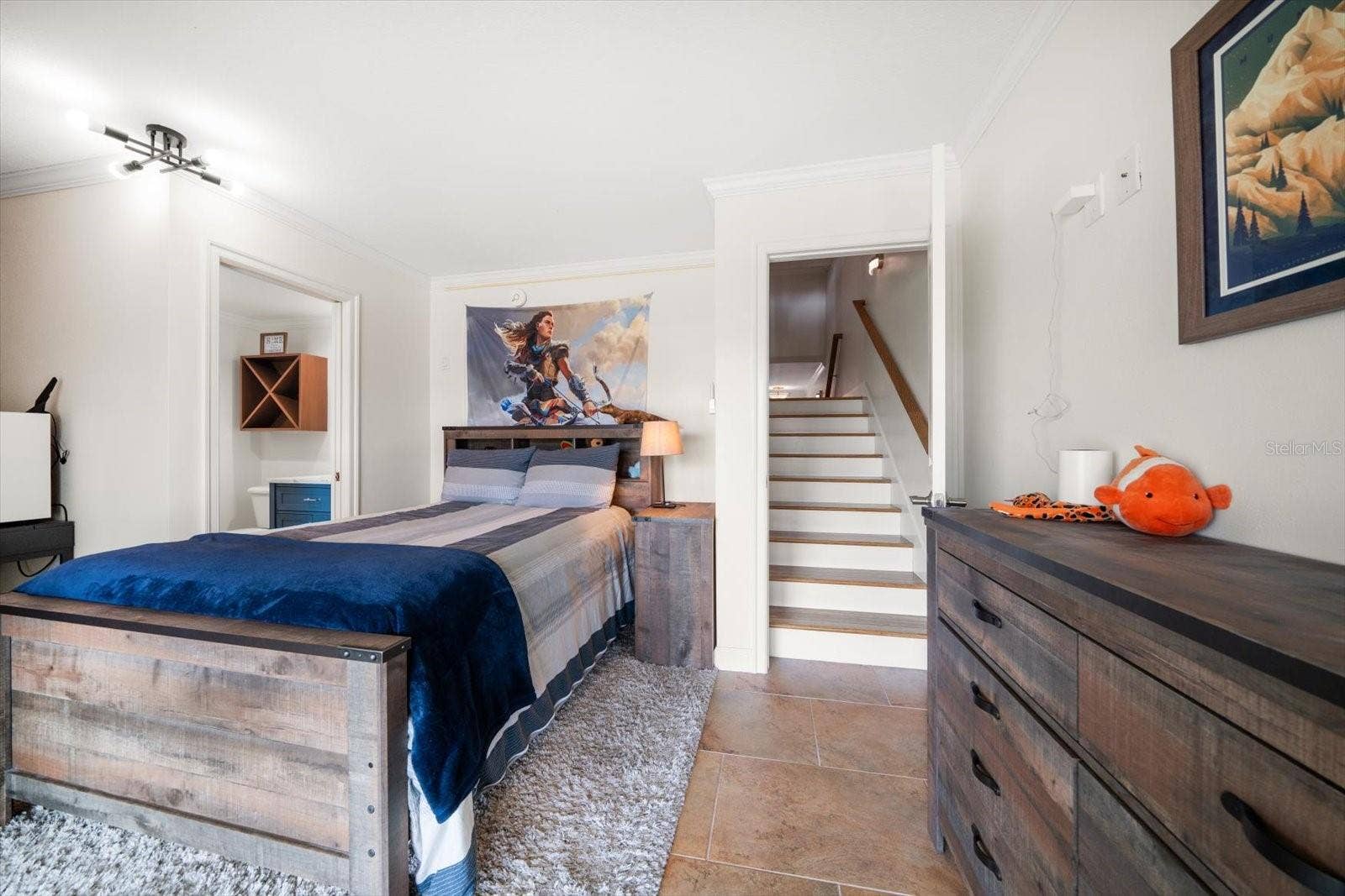 119 MARINA DEL REY COURT, Clearwater Beach, FL 33767 Easy interior access from main level to bonus room with ensuite bath on ground level