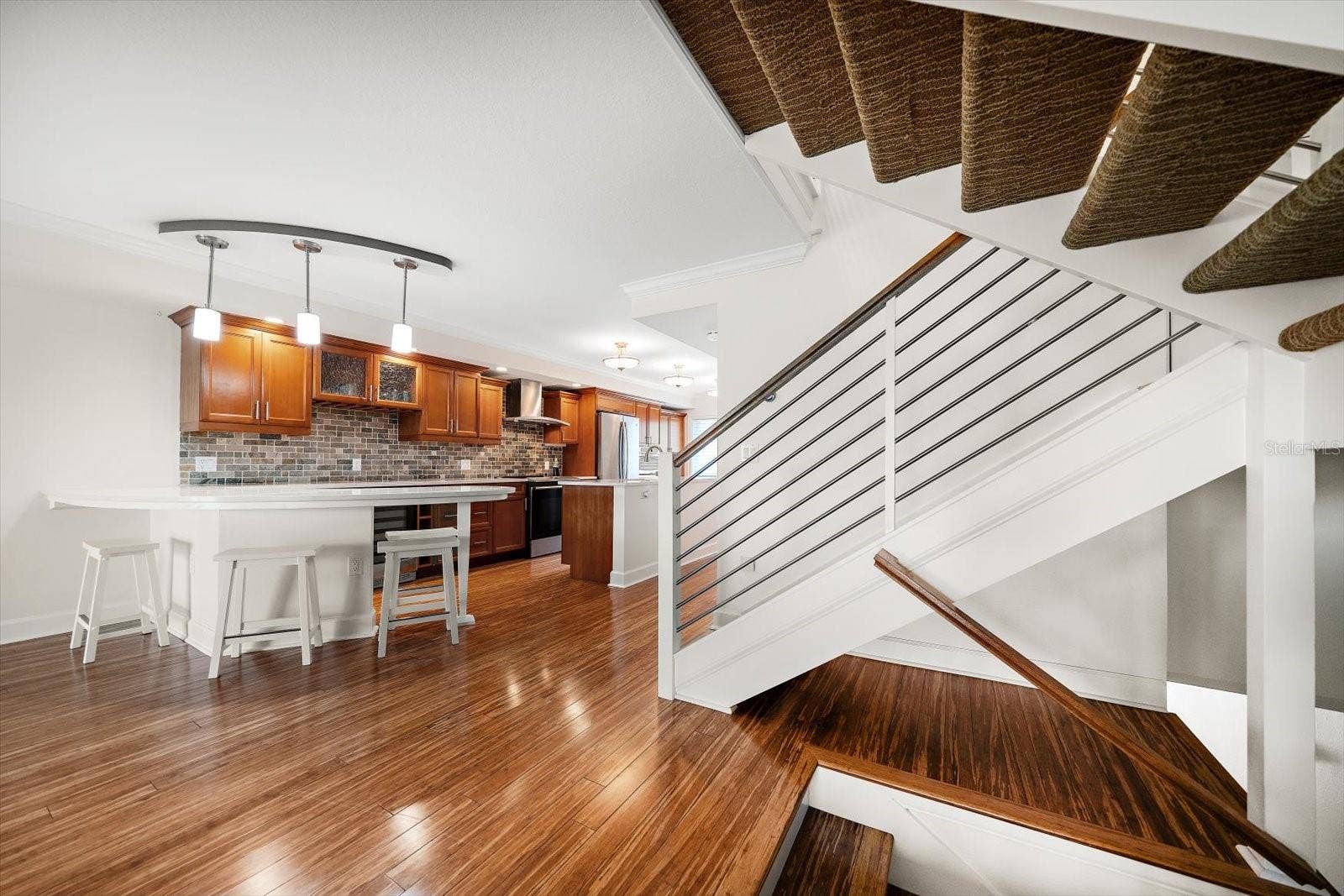 119 MARINA DEL REY COURT, Clearwater Beach, FL 33767 Modern finishes are found throughout include attractive staircase railings and bamboo flooring.