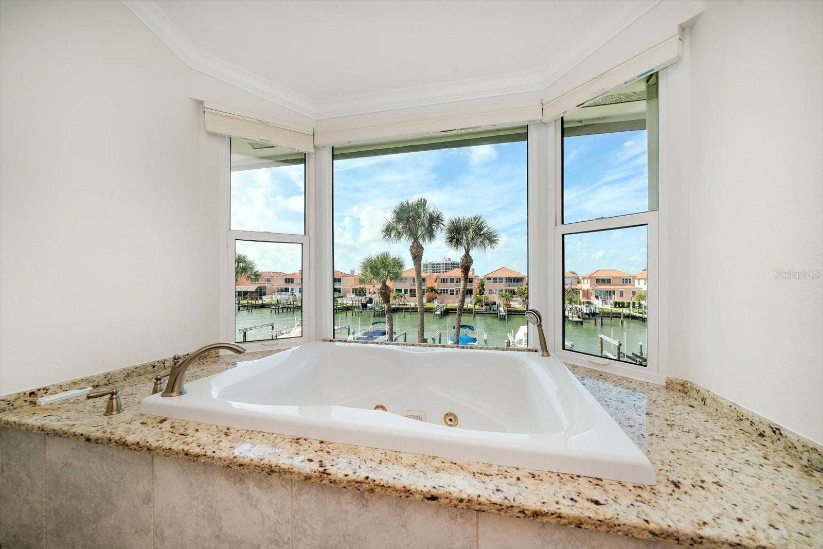 119 MARINA DEL REY COURT, Clearwater Beach, FL 33767 Soak up the view in your private bath!