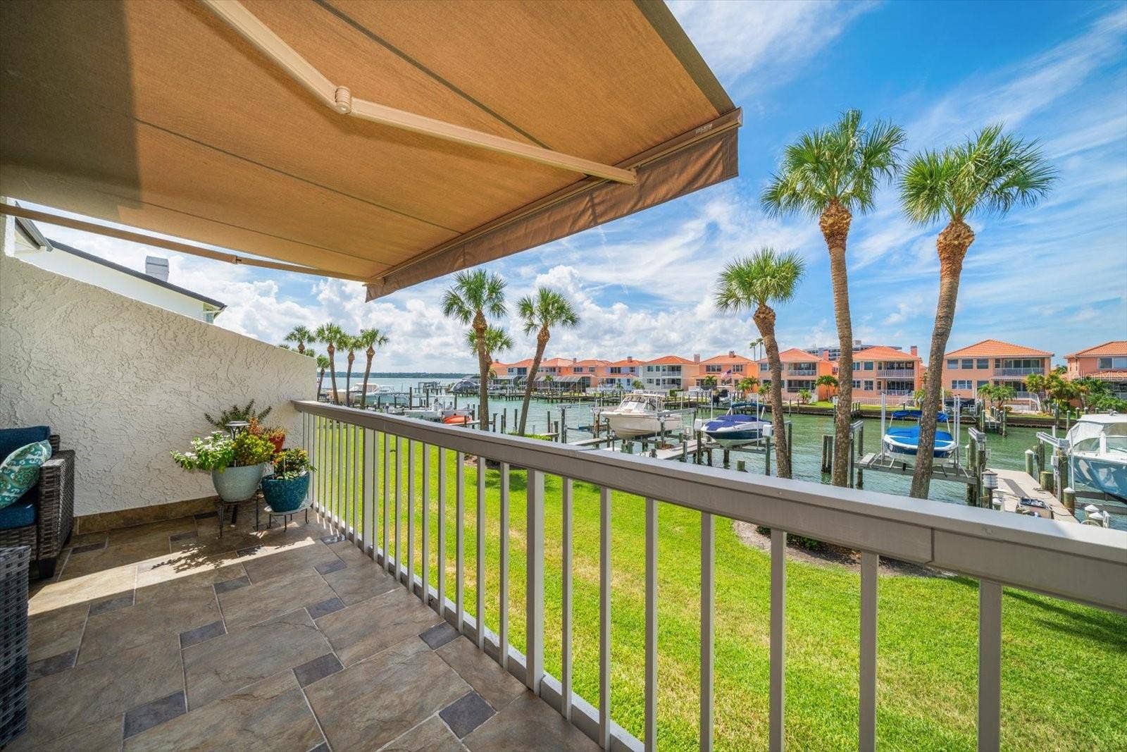 119 MARINA DEL REY COURT, Clearwater Beach, FL 33767 Soak up the sun or relax in the shade year-round from the privacy of your terrace.