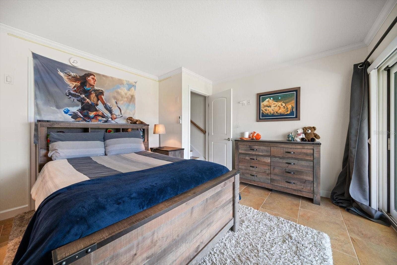 119 MARINA DEL REY COURT, Clearwater Beach, FL 33767 This private bonus area offers access to the ground level terrace.