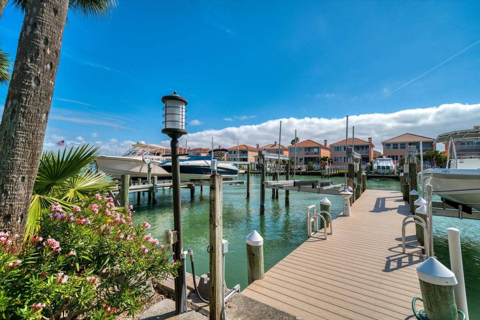119 MARINA DEL REY COURT, Clearwater Beach, FL 33767 Private dock and boat lift.