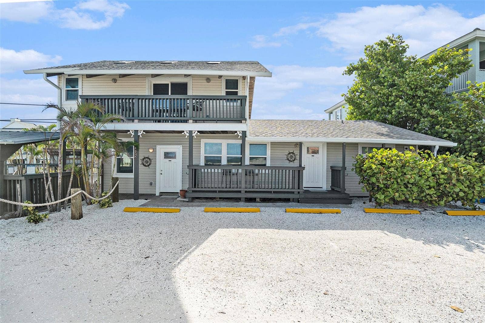 8425 W GULF BOULEVARD, Treasure Island, FL 33706 front two story home